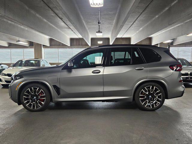 Photo of 2026 Frozen Pure Grey Metallic BMW X5 PHEV