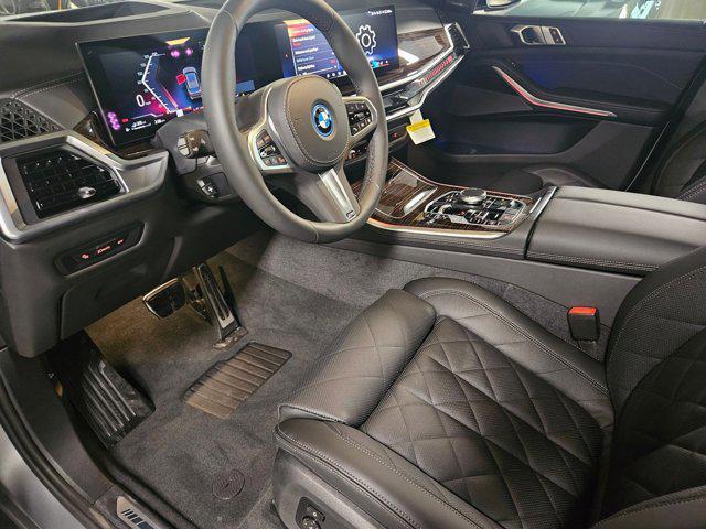 Photo of 2026 Frozen Pure Grey Metallic BMW X5 PHEV