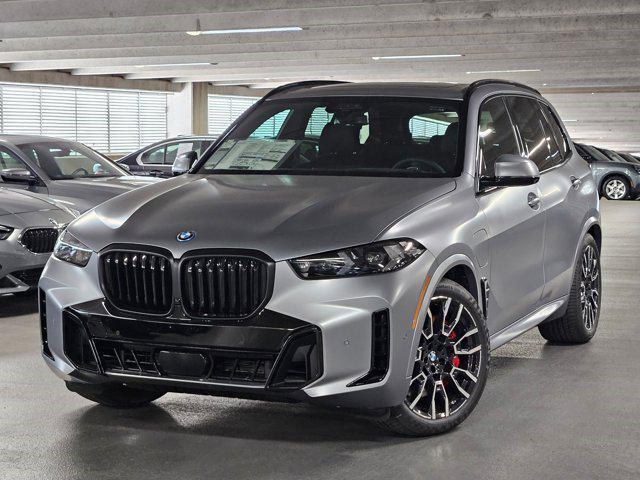 Photo of 2026 Frozen Pure Grey Metallic BMW X5 PHEV