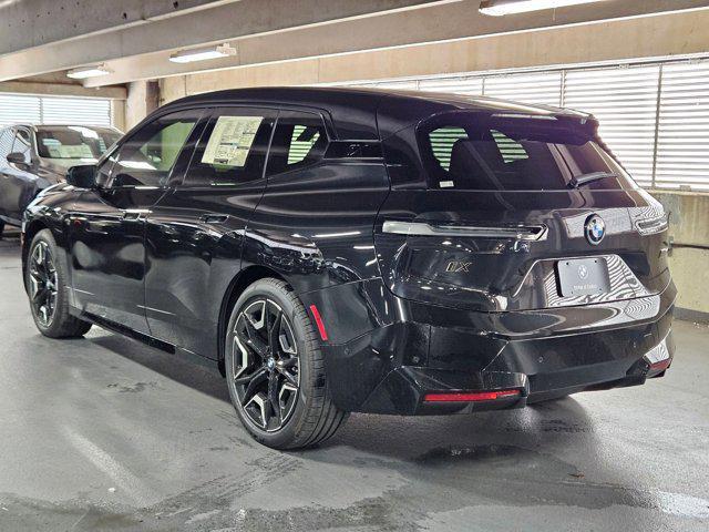 Photo of 2025 Black Sapphire Metallic BMW iX