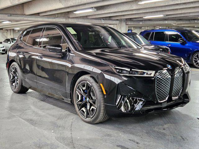 Photo of 2025 Black Sapphire Metallic BMW iX