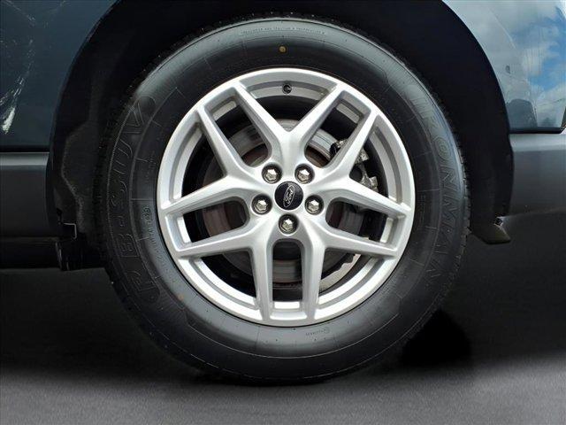 Photo of 2024 Stone Blue Metallic Ford Edge