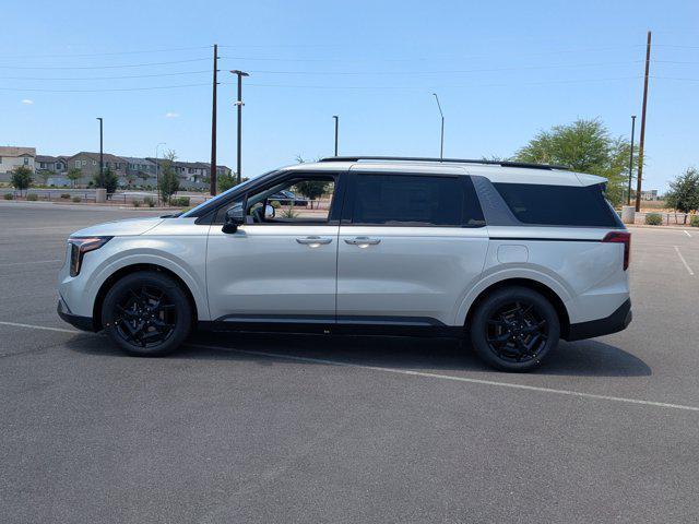 Photo of 2026 Ivory Silver Kia Carnival Hybrid