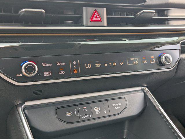 Photo of 2026 Ivory Silver Kia Carnival Hybrid