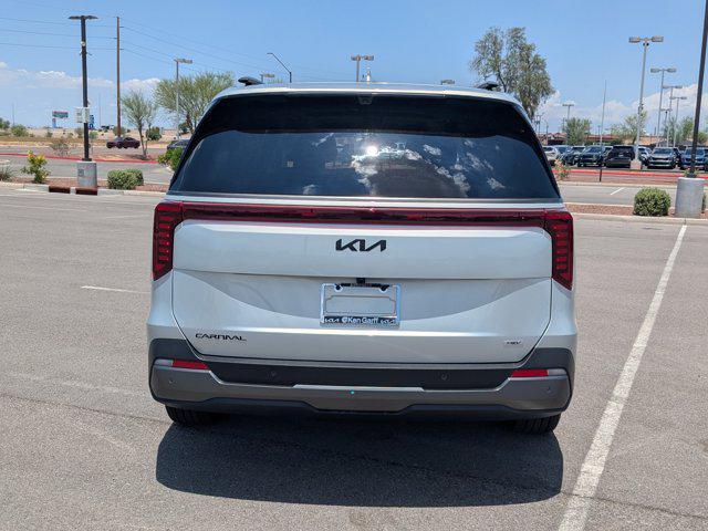 Photo of 2026 Ivory Silver Kia Carnival Hybrid
