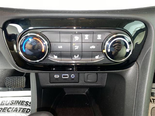 Photo of 2023 Summit White Buick Encore GX