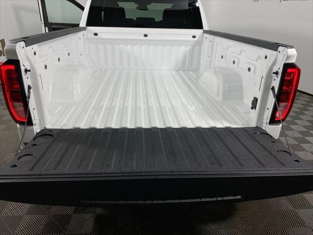 Photo of 2025 Summit White GMC Sierra 1500
