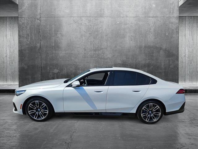 Photo of 2025 Mineral White Metallic BMW 530