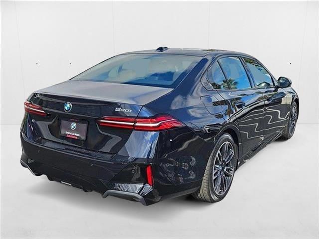 Photo of 2025 Carbon Black Metallic BMW 530