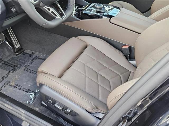 Photo of 2025 Carbon Black Metallic BMW 530