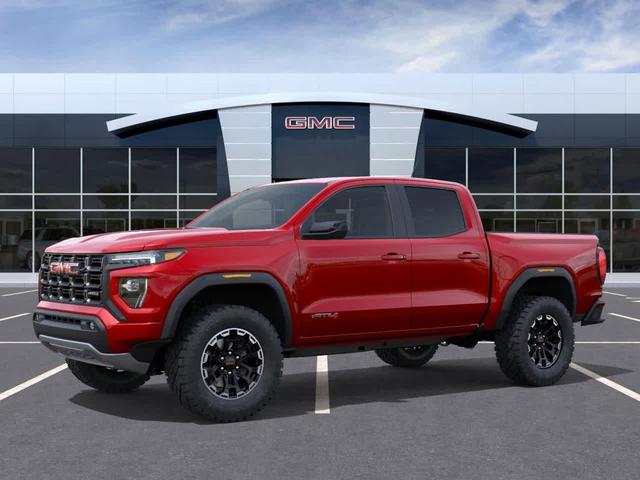 Photo of 2026 Volcanic Red Tintcoat GMC Canyon