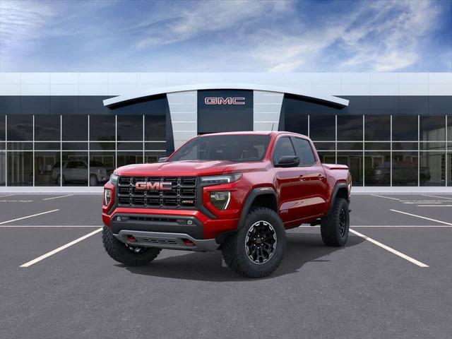 Photo of 2026 Volcanic Red Tintcoat GMC Canyon