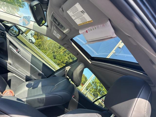 Photo of 2023 Midnight Black Metallic Toyota Camry