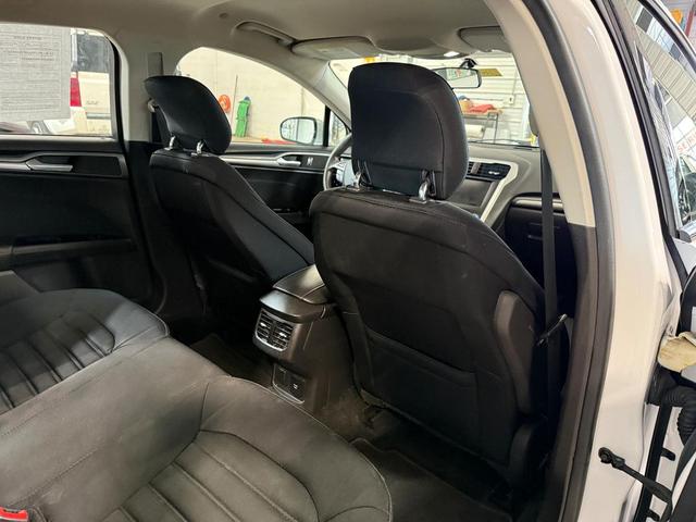 Photo of 2015 White Ford Fusion Hybrid