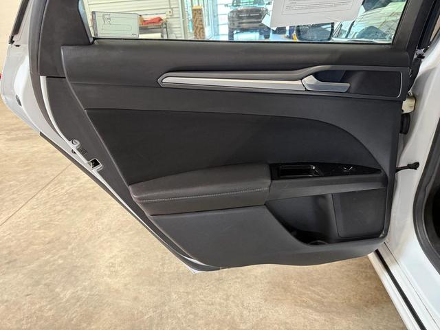 Photo of 2015 White Ford Fusion Hybrid