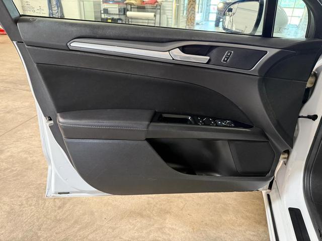 Photo of 2015 White Ford Fusion Hybrid
