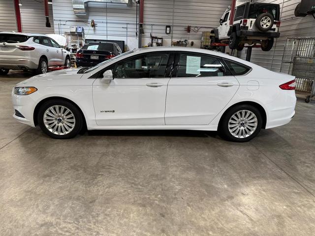 Photo of 2015 White Ford Fusion Hybrid