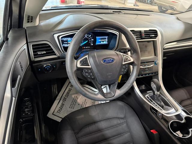 Photo of 2015 White Ford Fusion Hybrid
