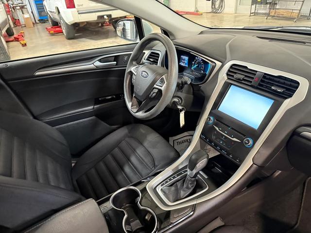 Photo of 2015 White Ford Fusion Hybrid