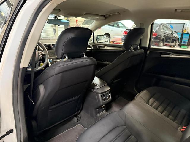 Photo of 2015 White Ford Fusion Hybrid