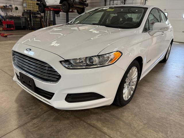 Photo of 2015 White Ford Fusion Hybrid
