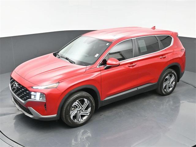 Photo of 2023 Calypso Red Hyundai SANTA FE