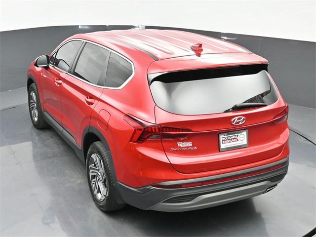 Photo of 2023 Calypso Red Hyundai SANTA FE