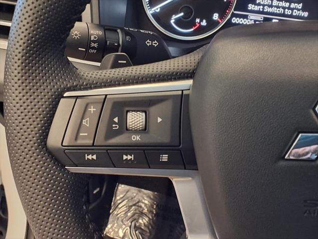 Photo of 2025 White Diamond With Black Roof Mitsubishi Outlander