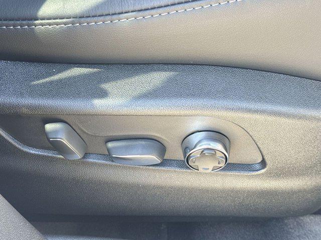 Photo of 2024 Crystal White Tricoat Cadillac XT4
