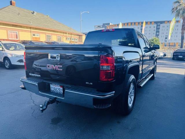 Photo of 2016 Onyx Black GMC Sierra 1500