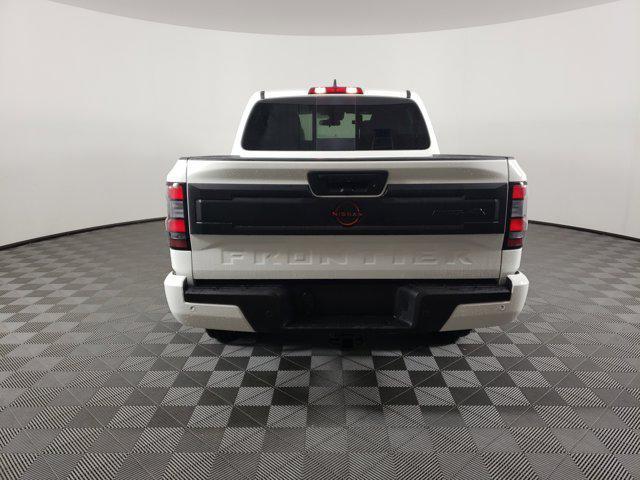 Photo of 2026 Glacier White Nissan Frontier