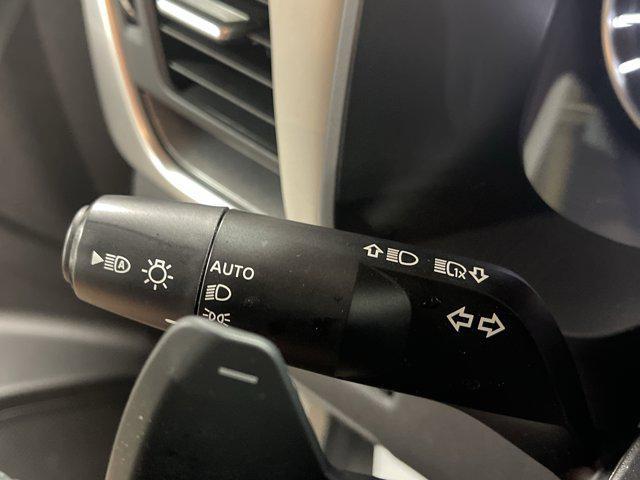 Photo of 2023 Pearl White Tricoat Nissan Rogue