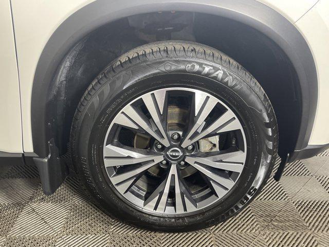 Photo of 2023 Pearl White Tricoat Nissan Rogue