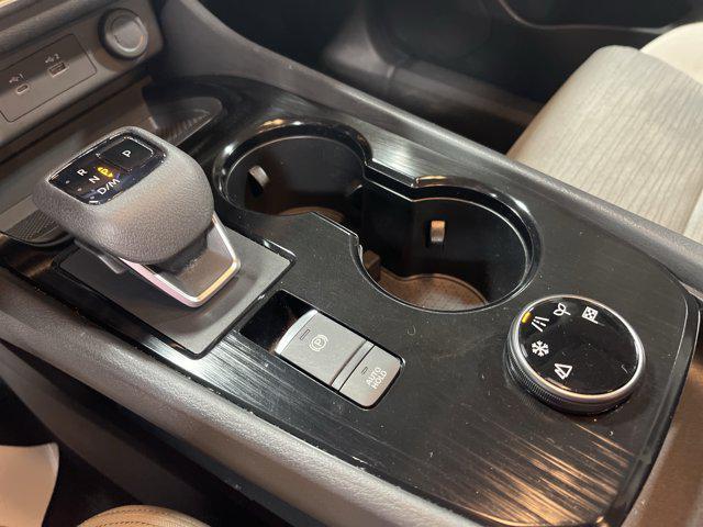 Photo of 2023 Pearl White Tricoat Nissan Rogue