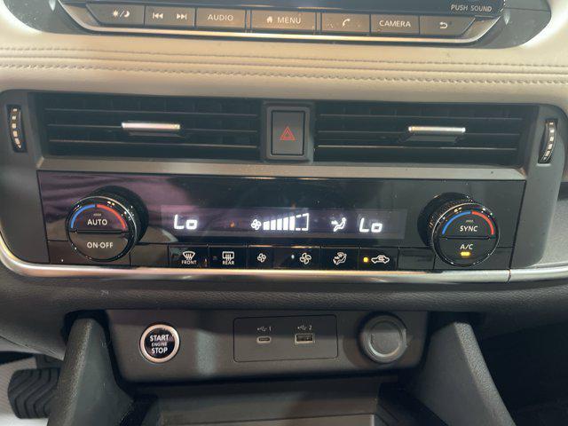 Photo of 2023 Pearl White Tricoat Nissan Rogue