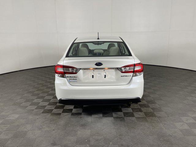 Photo of 2023 Crystal White Pearl Subaru Impreza