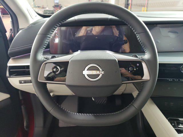 Photo of 2025 Scarlet Ember Tintcoat/Super Black Nissan Murano
