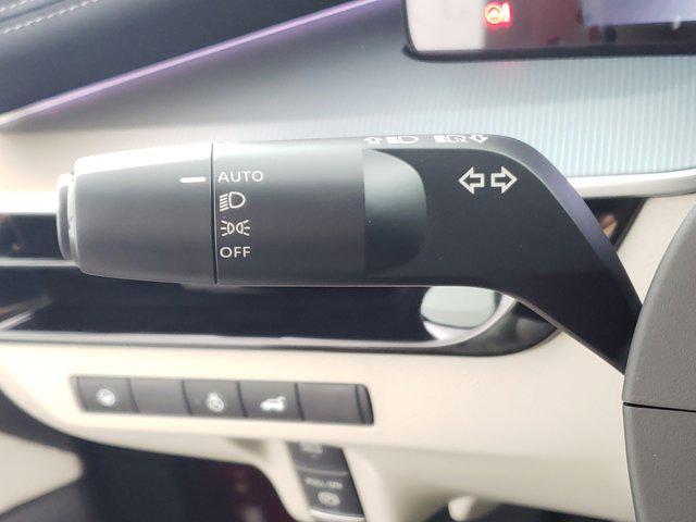 Photo of 2025 Scarlet Ember Tintcoat/Super Black Nissan Murano