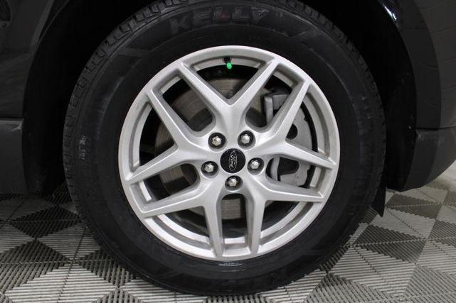 Photo of 2024 Agate Black Ford Edge