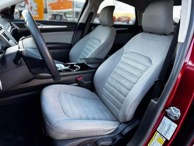 Photo of 2015 Ruby Red Tinted Clearcoat Ford Fusion