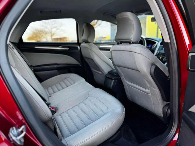 Photo of 2015 Ruby Red Tinted Clearcoat Ford Fusion
