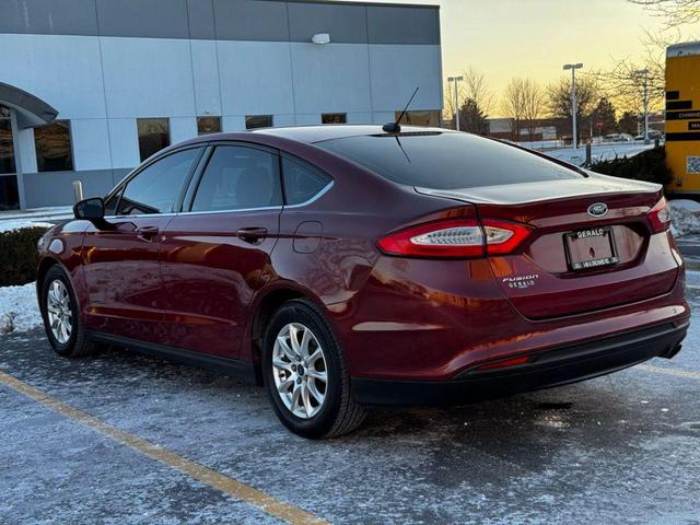 Photo of 2015 Ruby Red Tinted Clearcoat Ford Fusion