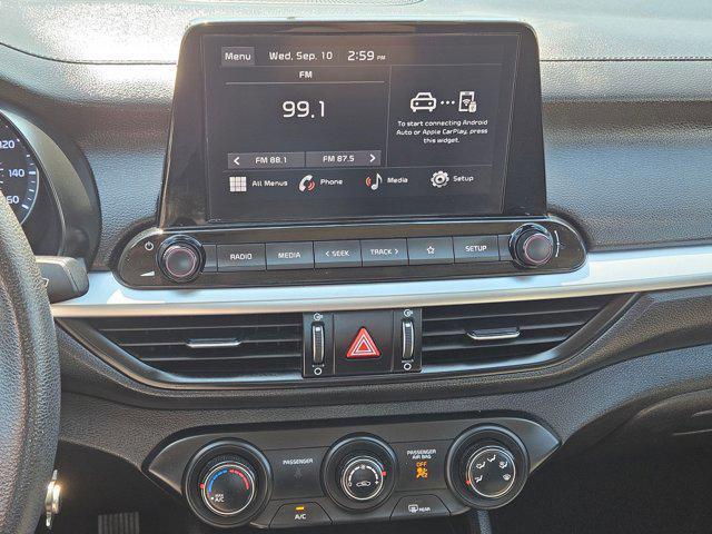 Photo of 2023 Currant Red Kia Forte