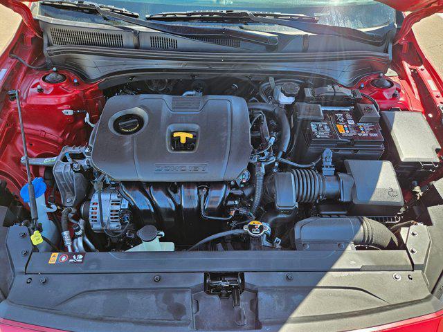 Photo of 2023 Currant Red Kia Forte
