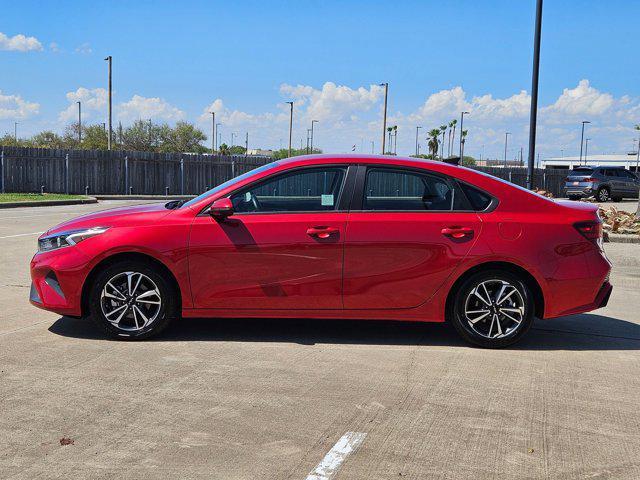 Photo of 2023 Currant Red Kia Forte