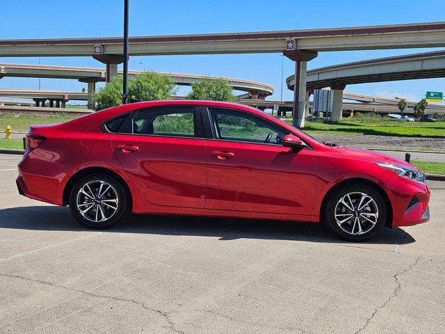 Photo of 2023 Currant Red Kia Forte