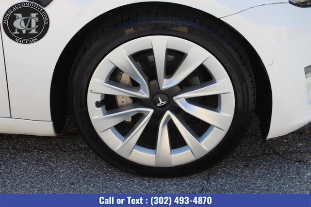 Photo of 2021 Pearl White Multi-Coat Tesla Model 3