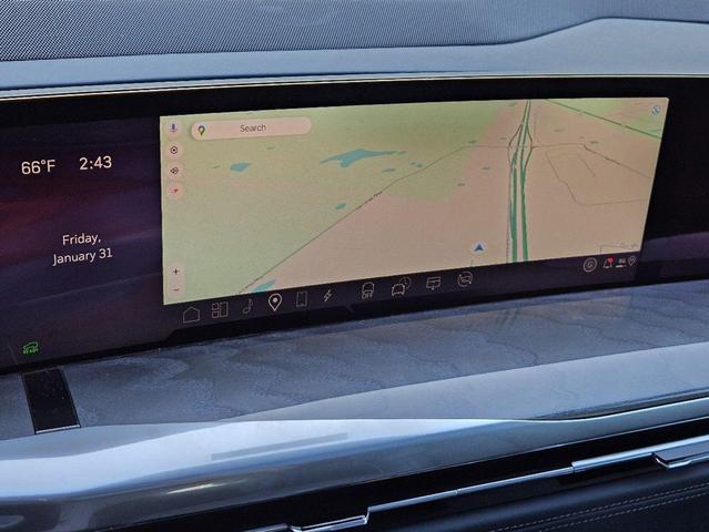 Photo of 2025 Black Raven Cadillac Escalade IQ