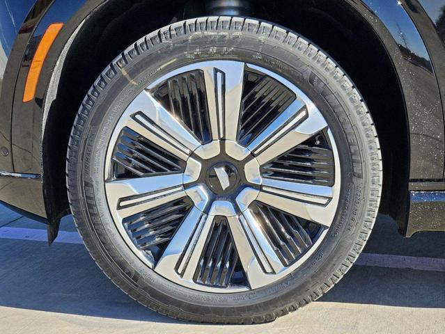 Photo of 2025 Black Raven Cadillac Escalade IQ