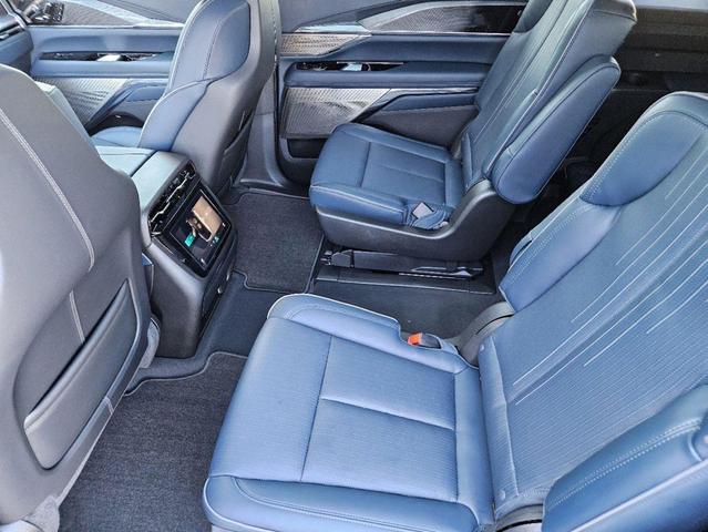 Photo of 2025 Black Raven Cadillac Escalade IQ